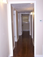 Hallway to bathroom and 3 bedrooms